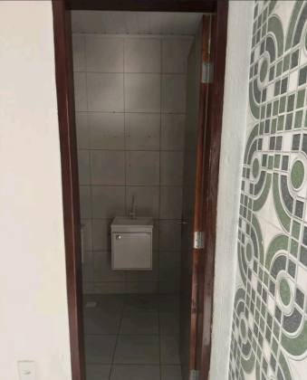 Linda casa com 3 quartos, sendo um suíte no Bairro Santo Antônio.