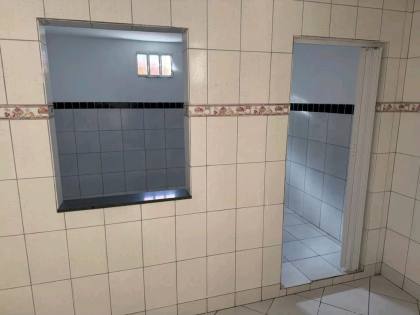 Linda casa com 3 quartos, sendo um suíte no Bairro Santo Antônio.