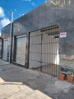 Vendo prédio com 2 pontos comerciais e casa no fundo