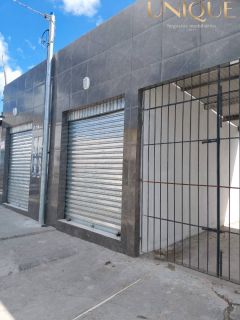 Vendo prédio com 2 pontos comerciais e casa no fundo