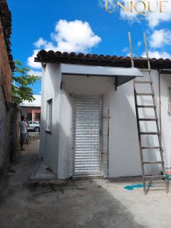 Vendo prédio com 2 pontos comerciais e casa no fundo
