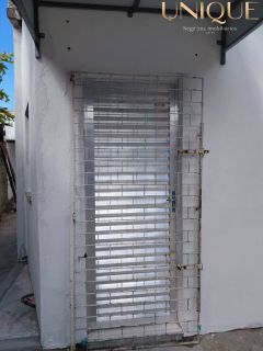Vendo prédio com 2 pontos comerciais e casa no fundo