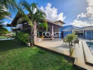 Casa alto padrão com 5/4 para vender em condomínio próximo da praia
