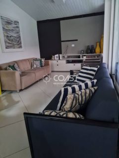 Vendo Excelente Casa com 3/4 em condomínio fechado em frente a praia