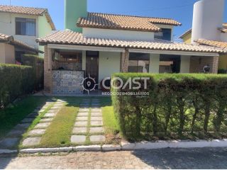 Vendo Excelente Casa com 3/4 em condomínio fechado em frente a praia