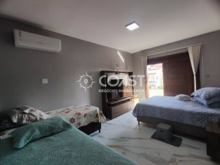 Casa em Condomínio com 7 quartos, sendo 3 suítes no bairro Aruana