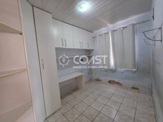 Vendo Casa na Aruana com 2 Quartos, Quintal Amplo e Escritura – Ótima Oportunidade!