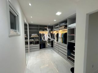 Mansão de Luxo no Alphaville Litoral Norte 1 – 5 Suítes, Piscina e Acabamento Exclusivo