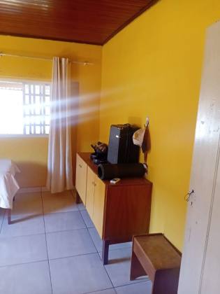 Casa com Amplo Quintal e Energia Solar Próxima à Av. Fernando Corrêa