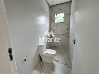 Casa de Condomínio Para Vender com 4 quartos sendo 3 suítes no bairro Papagaio em Feira De Santana