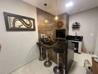 Aconchegante e bem localizado sobrado geminado a venda na praia de Balneário Perequê, em Porto Belo!