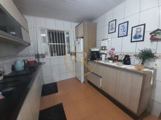 Casa Para Vender com 03 quartos 01 suítes no bairro Vila Nova em Porto Belo