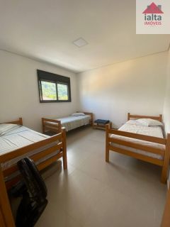 Sobrado Para Vender com 4 quartos 1 suítes no bairro Massaguaçu em Caraguatatuba