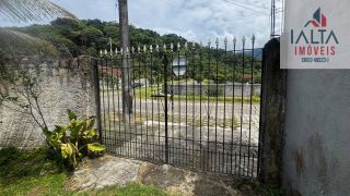 Terreno com casa de fundos, no Massaguaçu - Caraguatatuba/SP