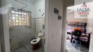 Terreno com casa de fundos, no Massaguaçu - Caraguatatuba/SP