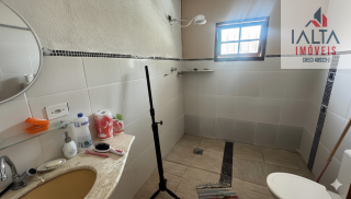 Terreno com casa de fundos, no Massaguaçu - Caraguatatuba/SP