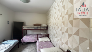 Terreno com casa de fundos, no Massaguaçu - Caraguatatuba/SP