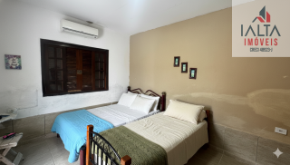 Terreno com casa de fundos, no Massaguaçu - Caraguatatuba/SP