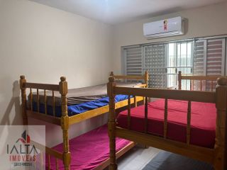 Apto Mobiliado com 2 Dormitórios a 45m da Praia Grande – Perfeito para Temporada