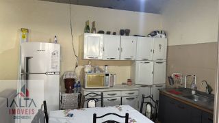 Terreno Comercial de 450m² no Jardim Carolina com 2 Comércios e Casa Residencial – Excelente Oportunidade de Investimento