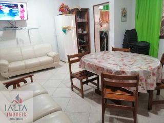 Sobrado Próximo à Praia com 3 Suítes, Área Gourmet e Amplo Jardim Frutífero