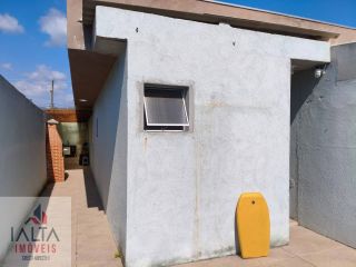 Casa à venda no Balneário dos Golfinhos com 2 quartos, com suíte e churrasqueira privativa
