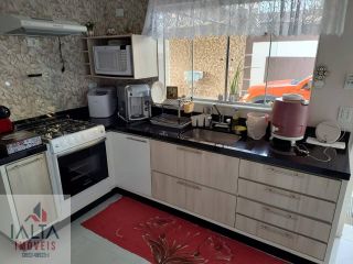 Casa 4 dorm. sendo 3 suites energia solar, piscina, hidromassagem, sauna, fino acabamento