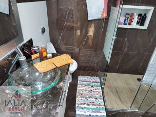 Casa 4 dorm. sendo 3 suites energia solar, piscina, hidromassagem, sauna, fino acabamento