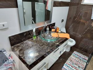 Casa 4 dorm. sendo 3 suites energia solar, piscina, hidromassagem, sauna, fino acabamento