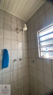 Locação de definitiva com 2 dormitórios, Porto Novo - Caraguatatuba/SP