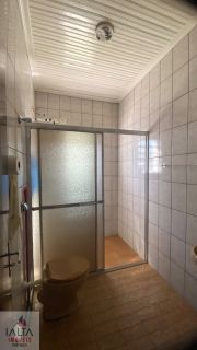 Locação de definitiva com 2 dormitórios, Porto Novo - Caraguatatuba/SP