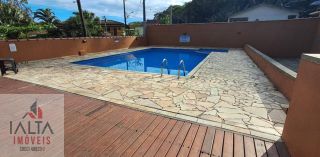 Pousada à venda em Caraguatatuba com 8 chalés e piscina em condomínio fechado
