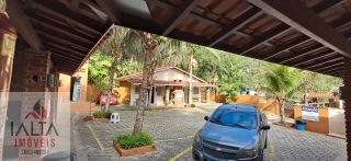 Pousada à venda em Caraguatatuba com 8 chalés e piscina em condomínio fechado