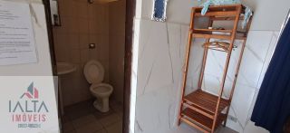 Pousada à venda em Caraguatatuba com 8 chalés e piscina em condomínio fechado