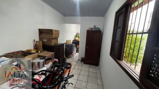 Casa de 2 dormitórios com edícula no Centro, Caraguatatuba/SP