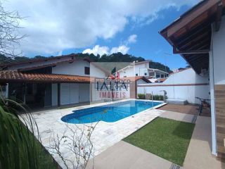 Casa à venda em Caraguatatuba com 4 quartos e piscina no Condomínio Tabatinga
