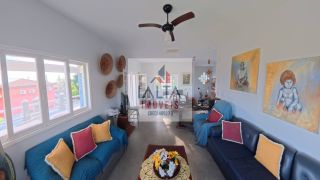 Casa de alto padrão à venda com 4 dormitórios e vista definitiva para o mar em bairro nobre
