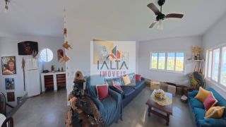 Casa de alto padrão à venda com 4 dormitórios e vista definitiva para o mar em bairro nobre