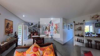 Casa de alto padrão à venda com 4 dormitórios e vista definitiva para o mar em bairro nobre