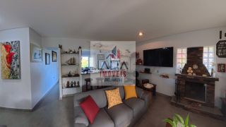 Casa de alto padrão à venda com 4 dormitórios e vista definitiva para o mar em bairro nobre