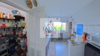 Casa de alto padrão à venda com 4 dormitórios e vista definitiva para o mar em bairro nobre
