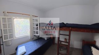 Casa de alto padrão à venda com 4 dormitórios e vista definitiva para o mar em bairro nobre