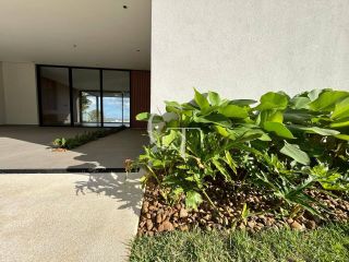 Casa à Venda no Fazenda Kurumin | 4 Suítes, Vista Livre e Piscina com Borda Infinita