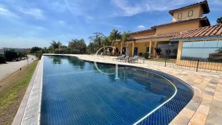 Casa à Venda no Fazenda Kurumin | 4 Suítes, Vista Livre e Piscina com Borda Infinita