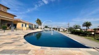 Casa à Venda no Fazenda Kurumin | 4 Suítes, Vista Livre e Piscina com Borda Infinita