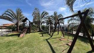 Casa à Venda no Fazenda Kurumin | 4 Suítes, Vista Livre e Piscina com Borda Infinita