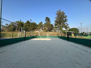Casa à Venda no Fazenda Kurumin | 4 Suítes, Vista Livre e Piscina com Borda Infinita