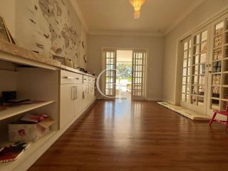 Casa térrea à venda no Condomínio Jardim Theodora em Itu – 3 suítes, escritório, espaço gourmet e piscina aquecida