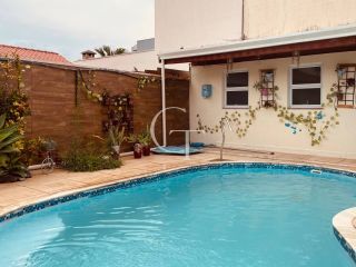 Casa de Condomínio térrea com 3 suítes, piscina R$1.060.000