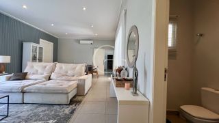 Casa térrea de esquina com piscina no Condomínio Fazenda Palmeiras Imperiais em Salto | 3 suítes | ao lado da área verde | aceita permuta